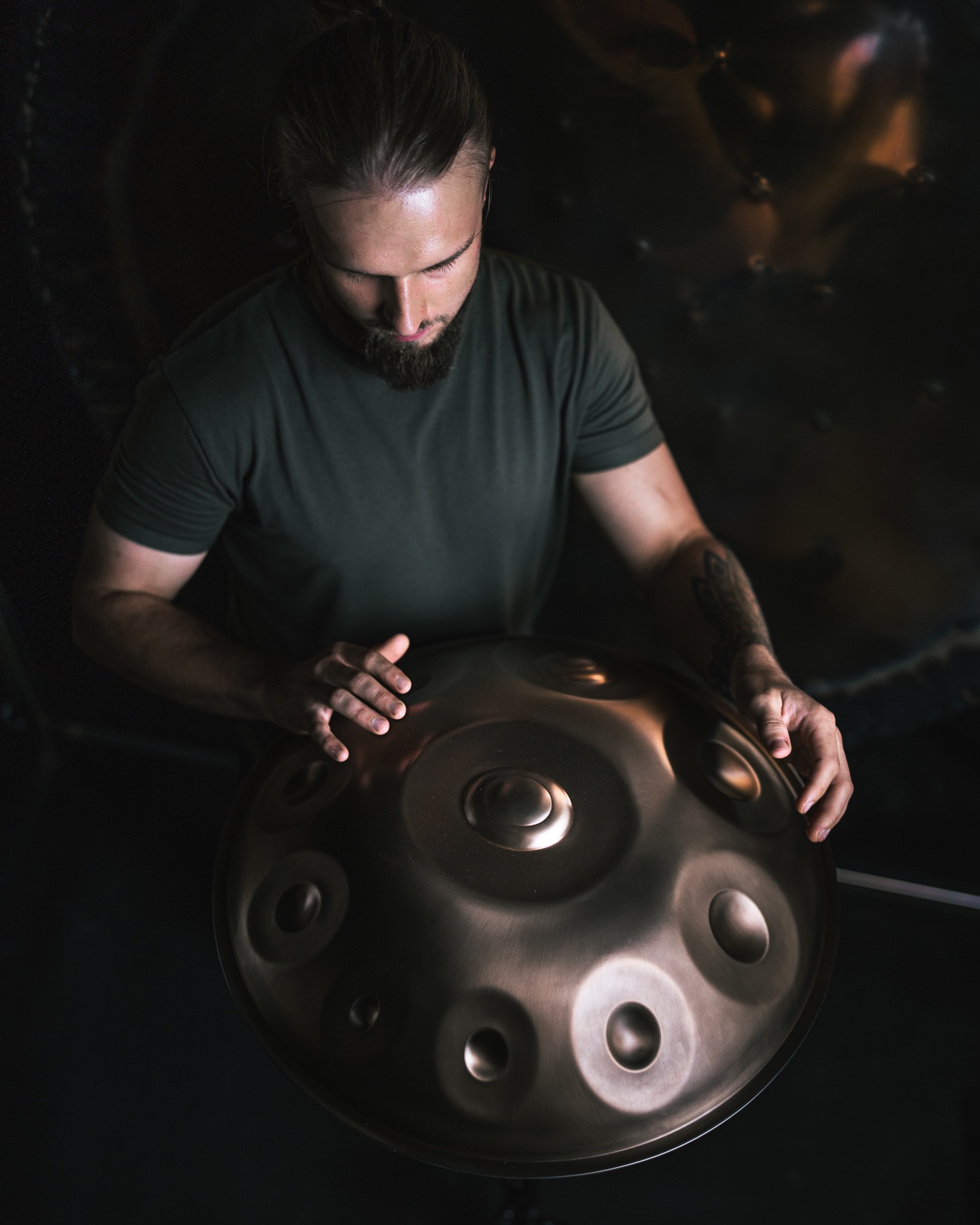 A musician playing the C Aegean 17 handpan